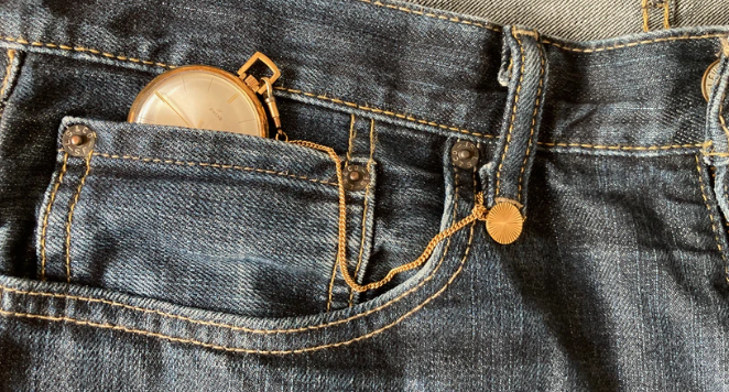 pocket watch in jeans pocket